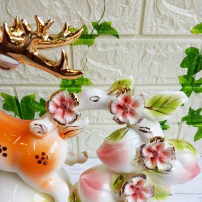 TƯỢNG HƯƠU VÀ HỒ LÔ VÀNG